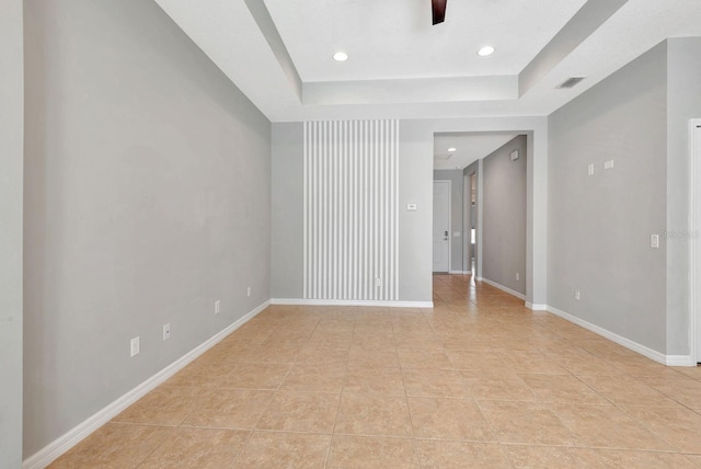 5005 Torrey Pines Run, Bradenton, FL 34211 - unfurnished room with a tray ceiling, light tile patterned floors, recessed lighting, and ceiling fan