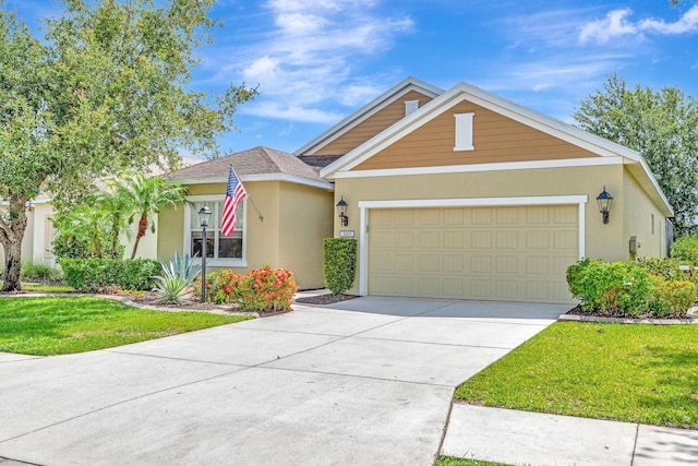 5005 Torrey Pines Run, Bradenton, FL 34211 - traditional-style house featuring stucco siding, driveway, an attached garage, and a front lawn