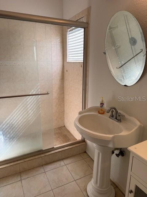 3404 56th Dr E, Bradenton, FL 34203 - full bathroom featuring a stall shower and tile patterned floors