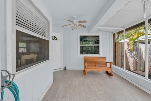 2218 Woodmere Rd, Venice, FL 34293 - unfurnished sunroom with beamed ceiling