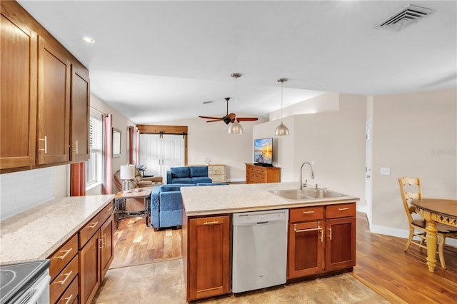 2218 Woodmere Rd, Venice, FL 34293 - kitchen with dishwasher, electric range, light countertops, a ceiling fan, and brown cabinets