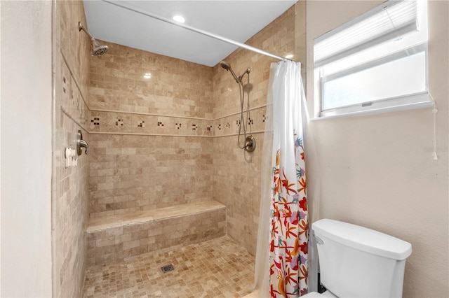 2218 Woodmere Rd, Venice, FL 34293 - bathroom featuring tiled shower and toilet