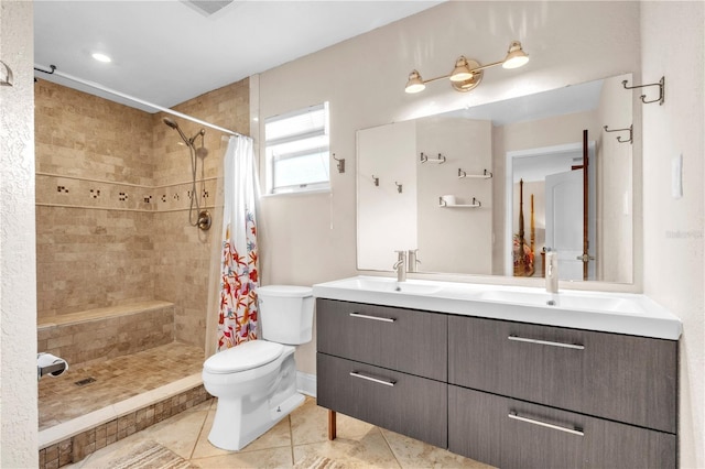 2218 Woodmere Rd, Venice, FL 34293 - full bath with double vanity, tiled shower, and tile patterned floors