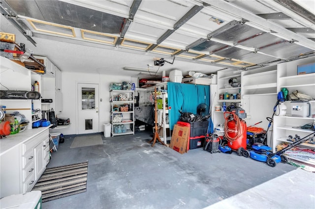 2218 Woodmere Rd, Venice, FL 34293 - garage featuring a garage door opener