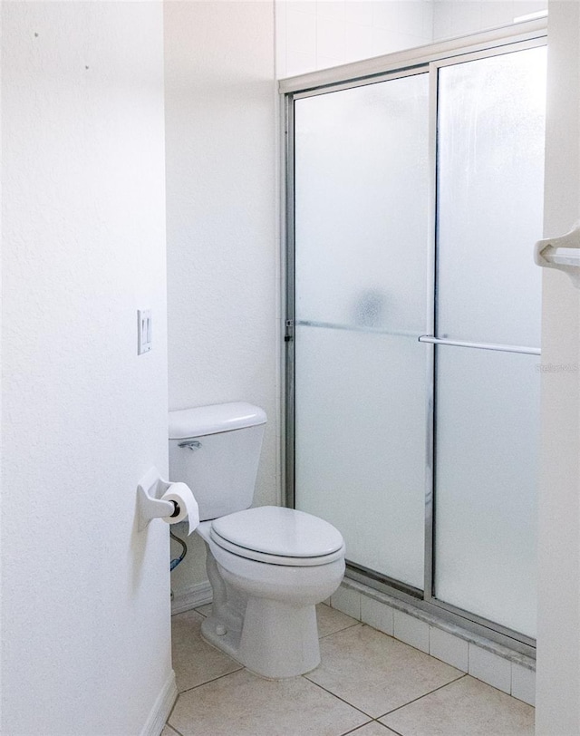7137 Cedar Hollow Cir, Bradenton, FL 34203 - bathroom featuring a shower stall and tile patterned flooring