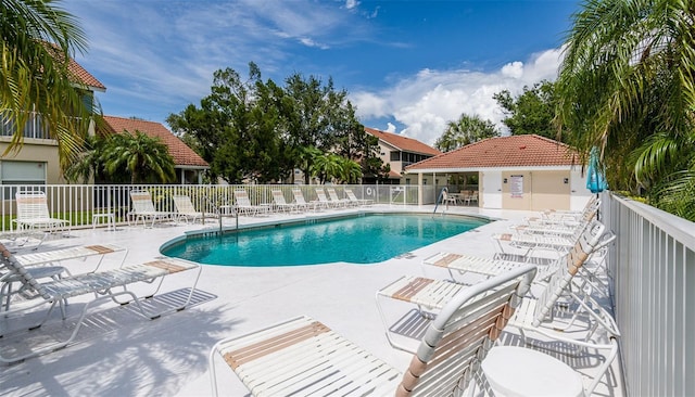 7137 Cedar Hollow Cir, Bradenton, FL 34203 - community pool featuring a patio