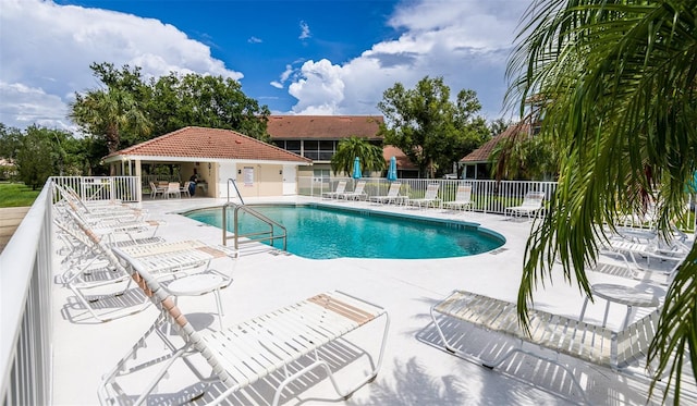 7137 Cedar Hollow Cir, Bradenton, FL 34203 - community pool with a patio area
