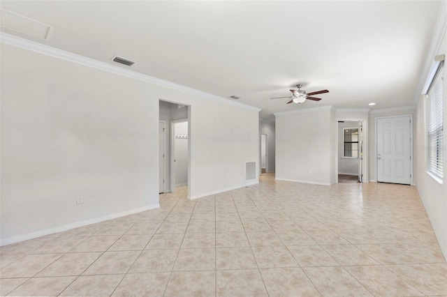 19023 Mangieri St, Venice, FL 34293 - spare room with ceiling fan, ornamental molding, and light tile patterned flooring