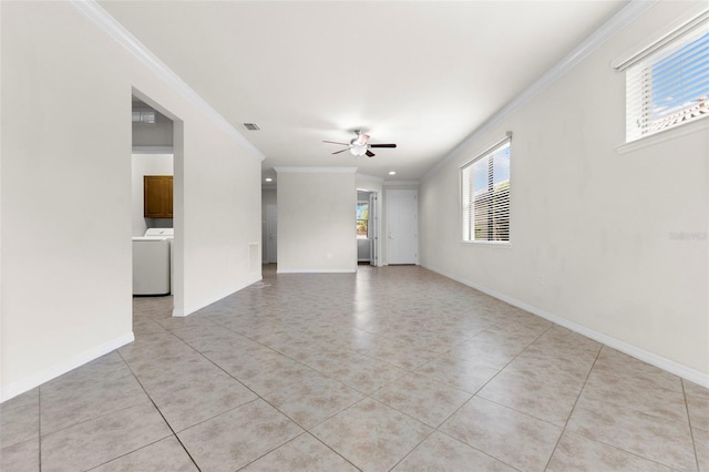 19023 Mangieri St, Venice, FL 34293 - empty room featuring ornamental molding, washer / clothes dryer, light tile patterned flooring, and a ceiling fan