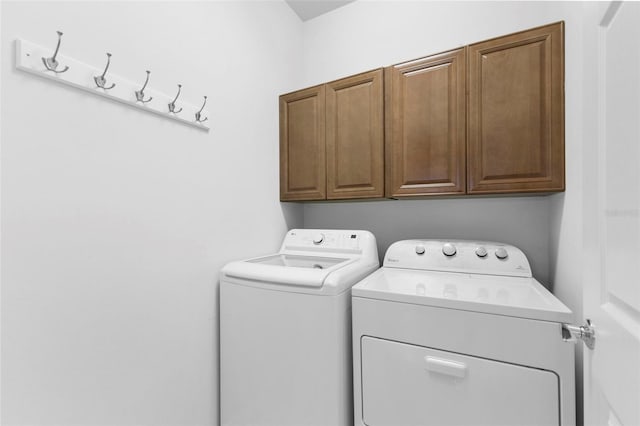 19023 Mangieri St, Venice, FL 34293 - washroom featuring cabinet space and independent washer and dryer