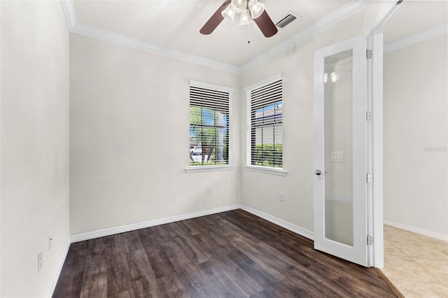 19023 Mangieri St, Venice, FL 34293 - empty room featuring wood finished floors, ceiling fan, and crown molding