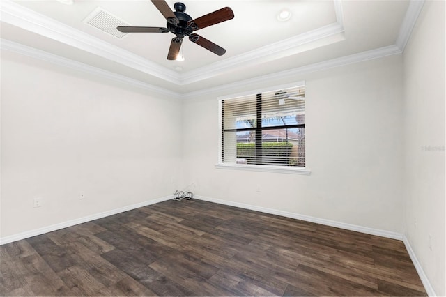 19023 Mangieri St, Venice, FL 34293 - empty room featuring dark wood-type flooring, a tray ceiling, ceiling fan, and ornamental molding