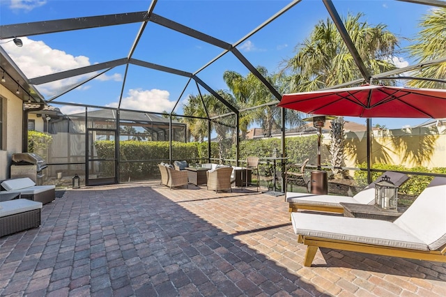 19023 Mangieri St, Venice, FL 34293 - view of patio / terrace featuring a grill, outdoor lounge area, outdoor dining space, and a lanai