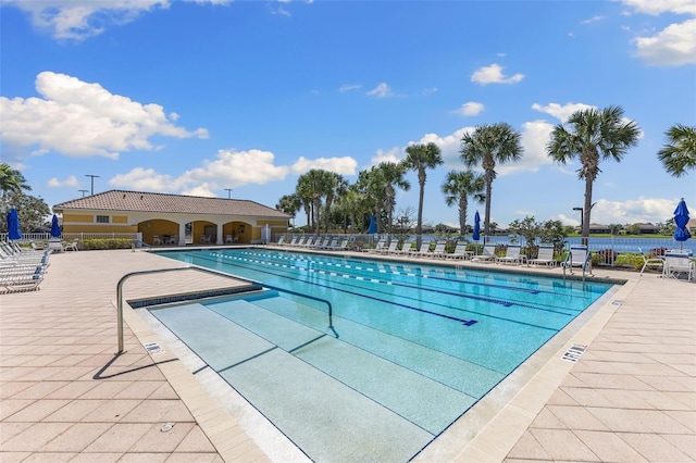 19023 Mangieri St, Venice, FL 34293 - community pool featuring a patio area