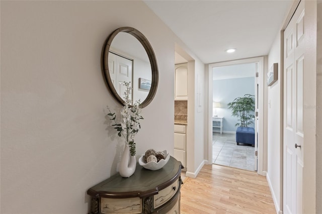 6265 Midnight Pass Rd Unit 205, Sarasota, FL 34242 - hall with light wood-style flooring and baseboards