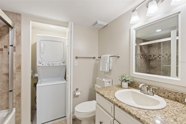 6265 Midnight Pass Rd Unit 205, Sarasota, FL 34242 - full bath featuring stacked washer / dryer, a tile shower, and vanity