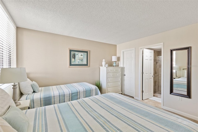 6265 Midnight Pass Rd Unit 205, Sarasota, FL 34242 - bedroom featuring a textured ceiling and baseboards