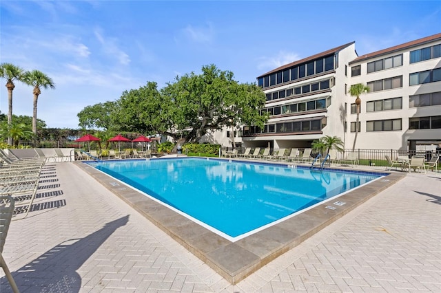 6265 Midnight Pass Rd Unit 205, Sarasota, FL 34242 - community pool featuring a patio