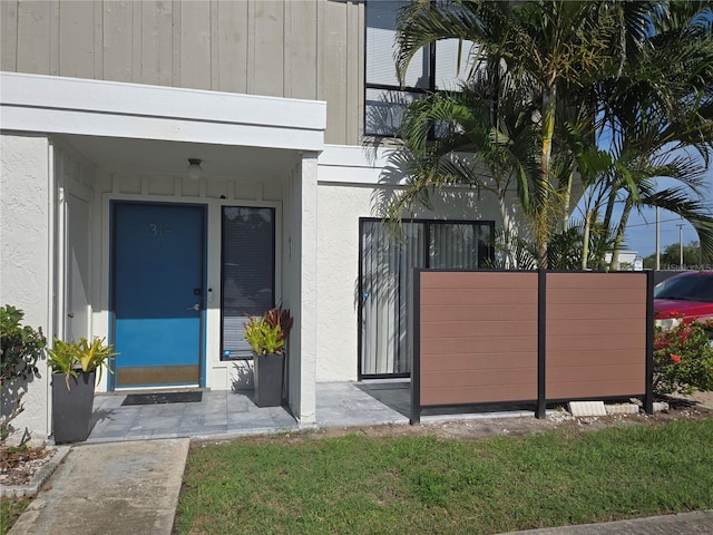 4001 Beneva Rd Unit 319, Sarasota, FL 34233 - view of exterior entry with stucco siding