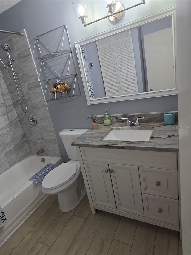 4001 Beneva Rd Unit 319, Sarasota, FL 34233 - bathroom with vanity, wood finished floors, and shower / bath combination