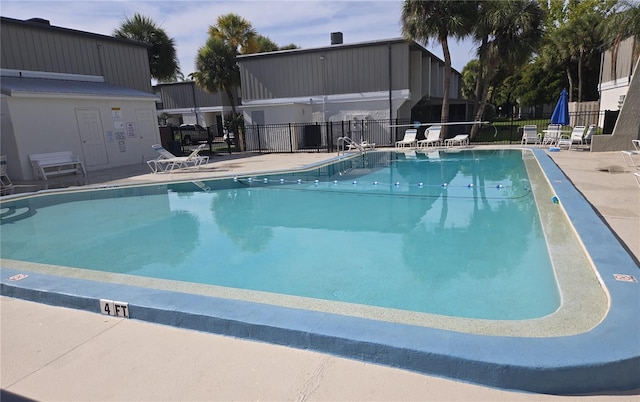 4001 Beneva Rd Unit 319, Sarasota, FL 34233 - community pool featuring a patio