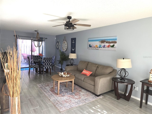 4001 Beneva Rd Unit 319, Sarasota, FL 34233 - living room with wood tiled floors and a ceiling fan