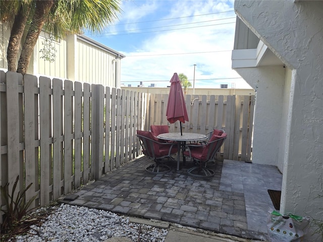 4001 Beneva Rd Unit 319, Sarasota, FL 34233 - view of patio with outdoor dining area