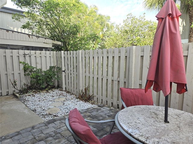 4001 Beneva Rd Unit 319, Sarasota, FL 34233 - fenced backyard with a patio