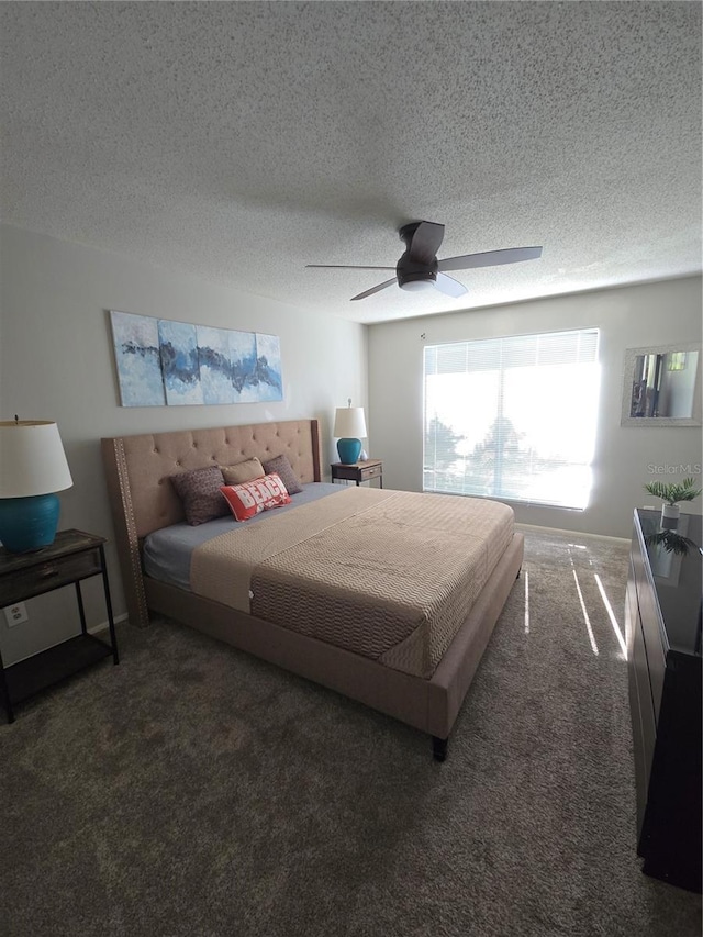 4001 Beneva Rd Unit 319, Sarasota, FL 34233 - carpeted bedroom with ceiling fan and a textured ceiling