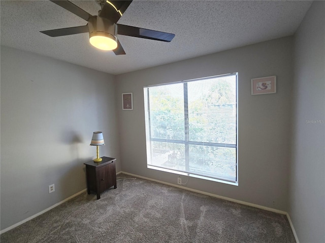 4001 Beneva Rd Unit 319, Sarasota, FL 34233 - carpeted spare room featuring a textured ceiling and ceiling fan