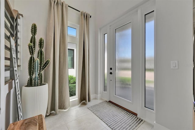 6317 Turtle Grass Dr, Bradenton, FL 34210 - foyer entrance featuring light tile patterned flooring