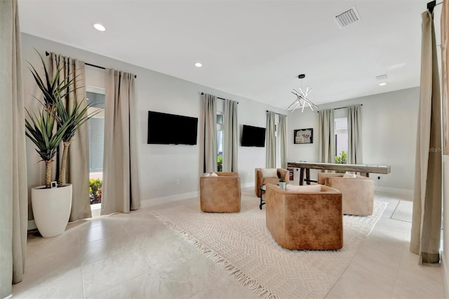 6317 Turtle Grass Dr, Bradenton, FL 34210 - living area with recessed lighting and light tile patterned floors