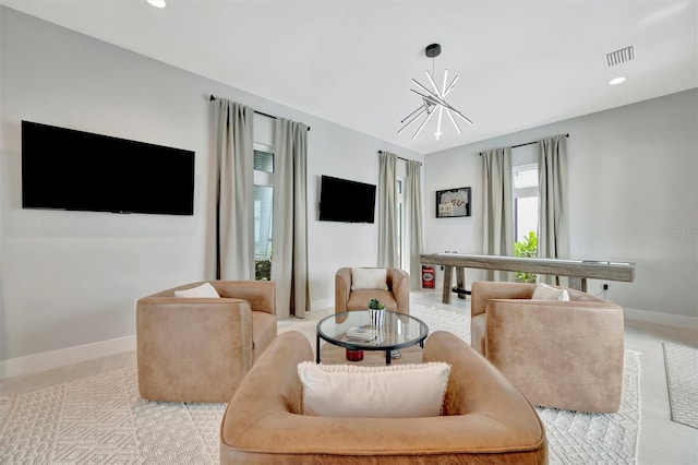 6317 Turtle Grass Dr, Bradenton, FL 34210 - living room with a chandelier and recessed lighting