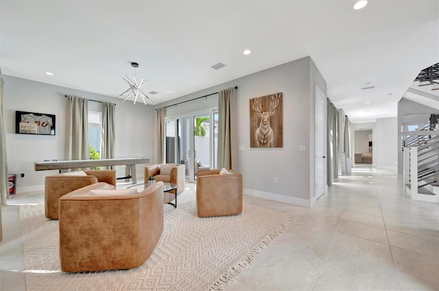 6317 Turtle Grass Dr, Bradenton, FL 34210 - sitting room with a chandelier and recessed lighting