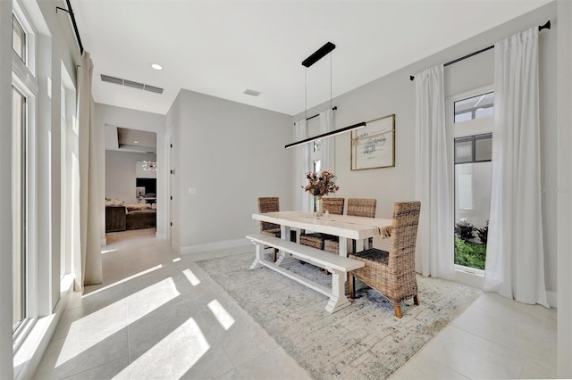 6317 Turtle Grass Dr, Bradenton, FL 34210 - dining area with recessed lighting and light tile patterned flooring