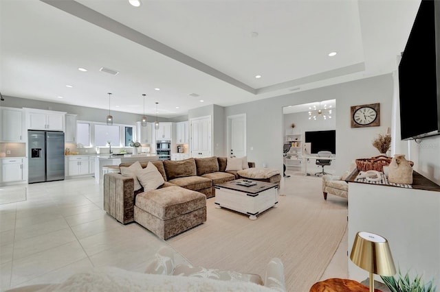 6317 Turtle Grass Dr, Bradenton, FL 34210 - living room featuring light tile patterned flooring and recessed lighting