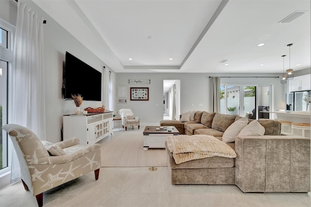 6317 Turtle Grass Dr, Bradenton, FL 34210 - living room featuring recessed lighting and light tile patterned floors