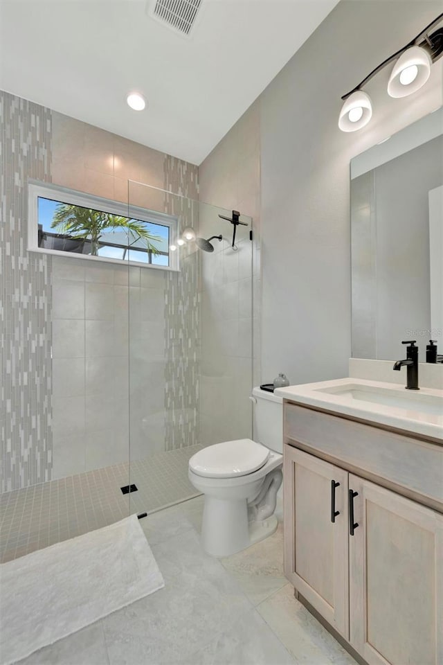 6317 Turtle Grass Dr, Bradenton, FL 34210 - bathroom featuring vanity and a walk in shower
