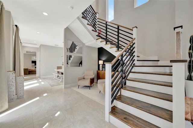 6317 Turtle Grass Dr, Bradenton, FL 34210 - staircase featuring recessed lighting and a high ceiling