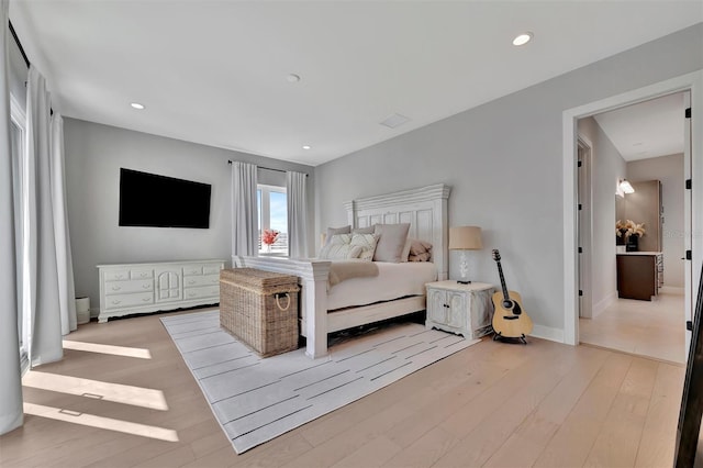 6317 Turtle Grass Dr, Bradenton, FL 34210 - bedroom with light wood-style floors and recessed lighting