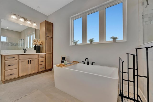 6317 Turtle Grass Dr, Bradenton, FL 34210 - full bath with vanity, a soaking tub, and tiled shower