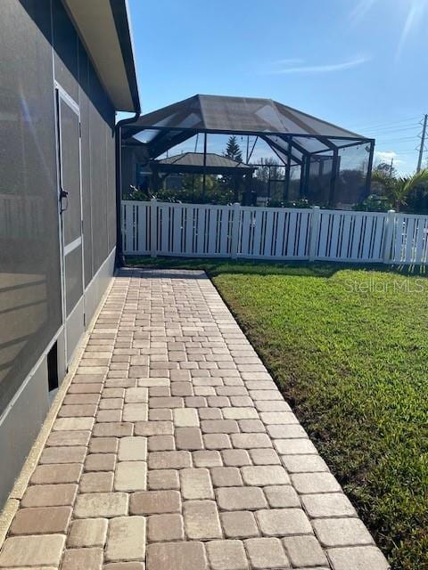 7750 Ridgelake Cir, Bradenton, FL 34203 - view of patio featuring glass enclosure