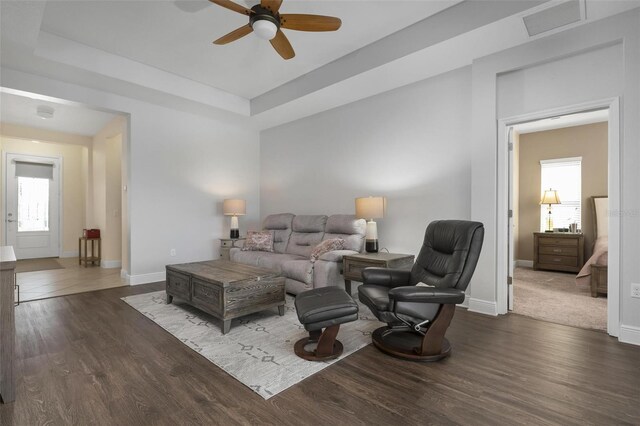 7750 Ridgelake Cir, Bradenton, FL 34203 - living room with a ceiling fan, plenty of natural light, and wood finished floors