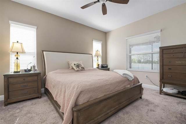 7750 Ridgelake Cir, Bradenton, FL 34203 - bedroom featuring light carpet and ceiling fan