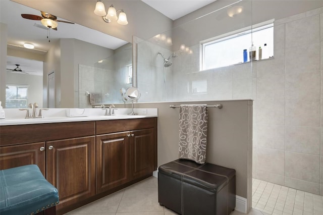 7750 Ridgelake Cir, Bradenton, FL 34203 - bathroom featuring a ceiling fan, a walk in shower, double vanity, and tile patterned flooring