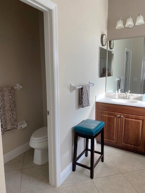 7750 Ridgelake Cir, Bradenton, FL 34203 - bathroom with vanity and tile patterned flooring