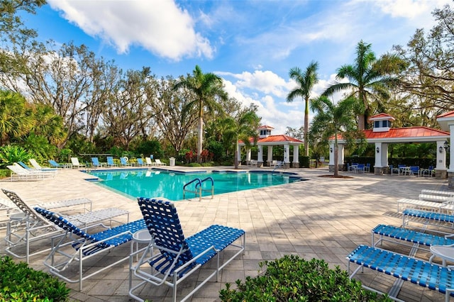 7750 Ridgelake Cir, Bradenton, FL 34203 - community pool with a gazebo and a patio area