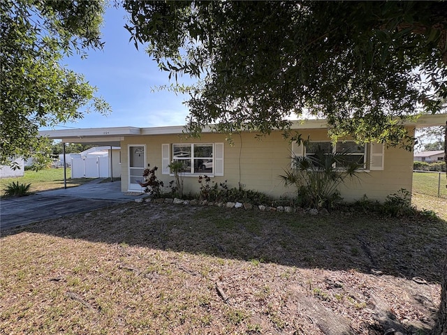 1224 38th St W, Bradenton, FL 34205 - ranch-style home with a carport and driveway