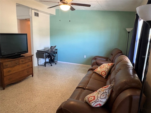 1224 38th St W, Bradenton, FL 34205 - living room featuring a ceiling fan and baseboards