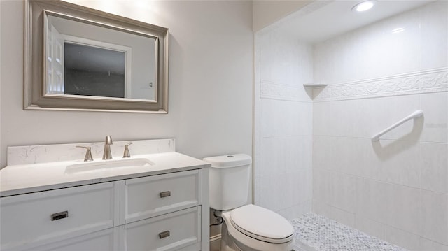 3525 Riviera Dr, Sarasota, FL 34232 - bathroom featuring vanity and a tile shower